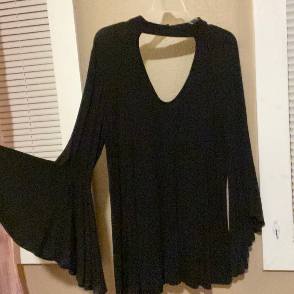 Black dramatic bell sleeve blouse